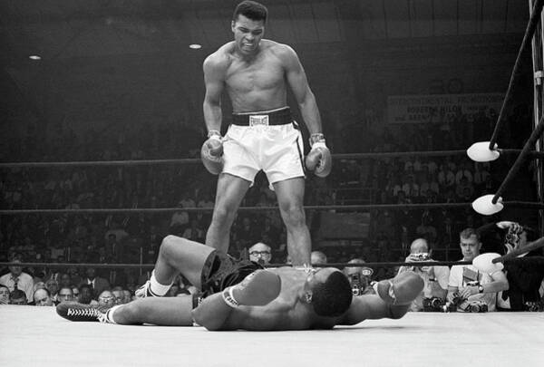 Wall Art - Photograph - Muhammad Ali Taunting Sonny Liston by Bettmann