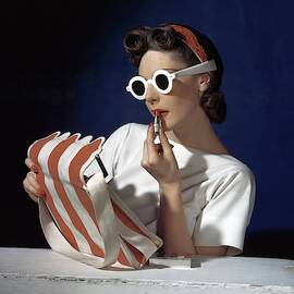 Muriel Maxwell Applying Lipstick by Horst P Horst