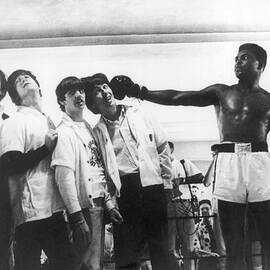 The Beatles And Muhammad Ali In 1964 by Keystone-france